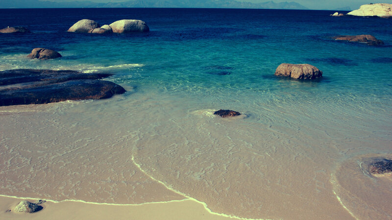 Beach with Rocks and Ocean — Blue, Serene, Afternoon, Photograph, Sand