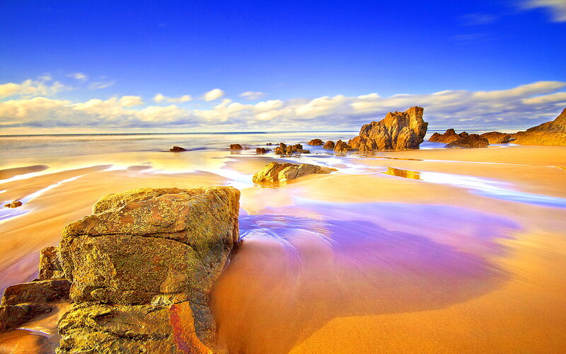 Beach with Rocks and Water — Blue