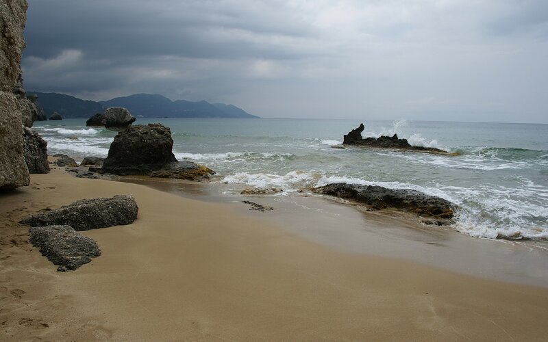 beach with rocks and waves