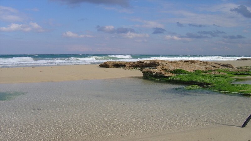 Beach with Rocks and Waves — Blue, Calm
