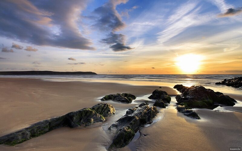 Beach with Rocks at Sunset — Blue, Serene, Photograph, Sand