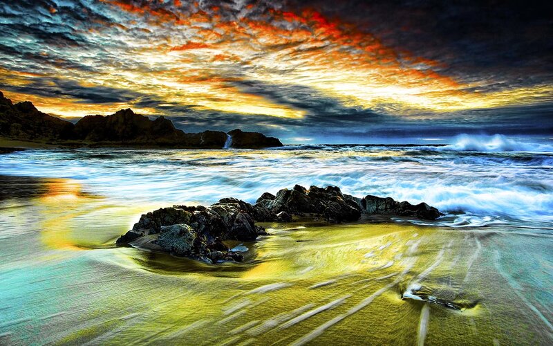 Beach with Rocks at Sunset — Yellow, Dramatic, Photograph