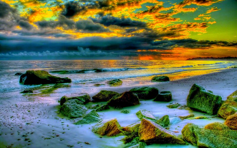 Beach with Rocks at Sunset — Yellow, Dramatic