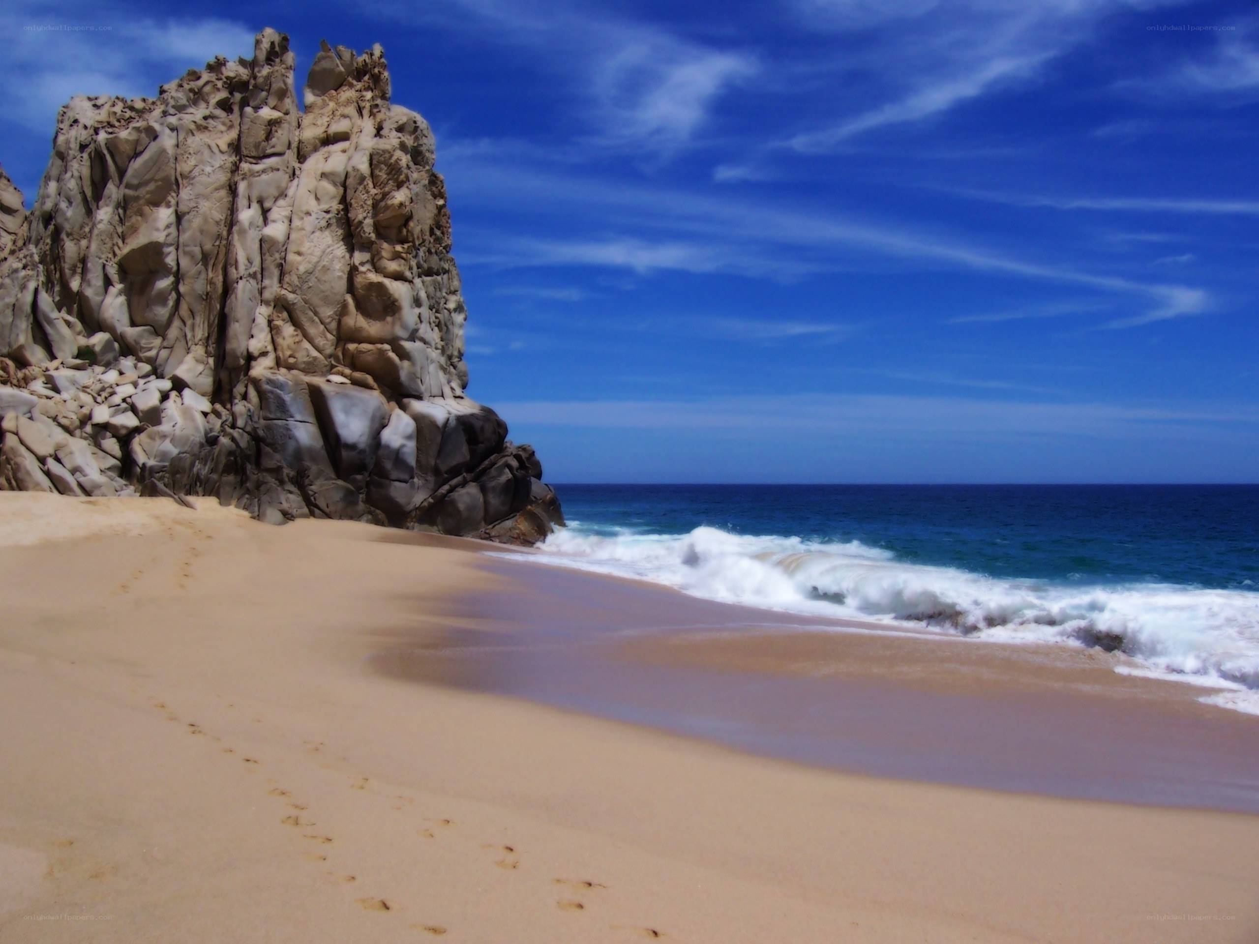 Beach with rocky cliff
