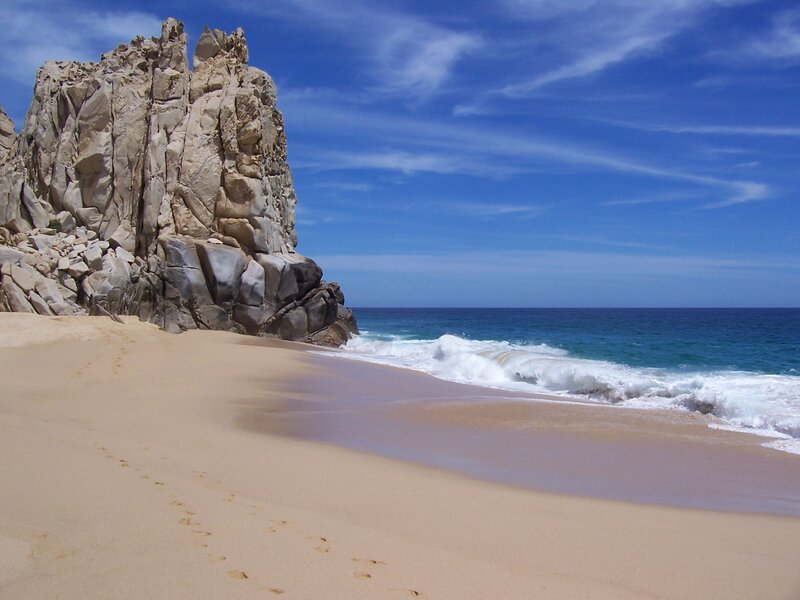 Beach with rocky cliff