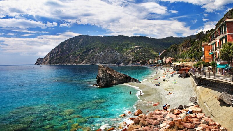 Beach with rocky cliffs and turquoise water
