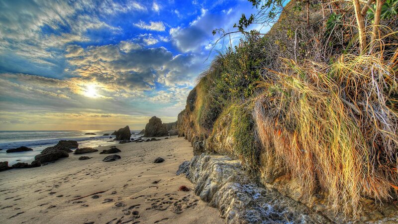 Beach with Rocky Cliffs — Blue, Dramatic, Sunset, Photograph, Sand
