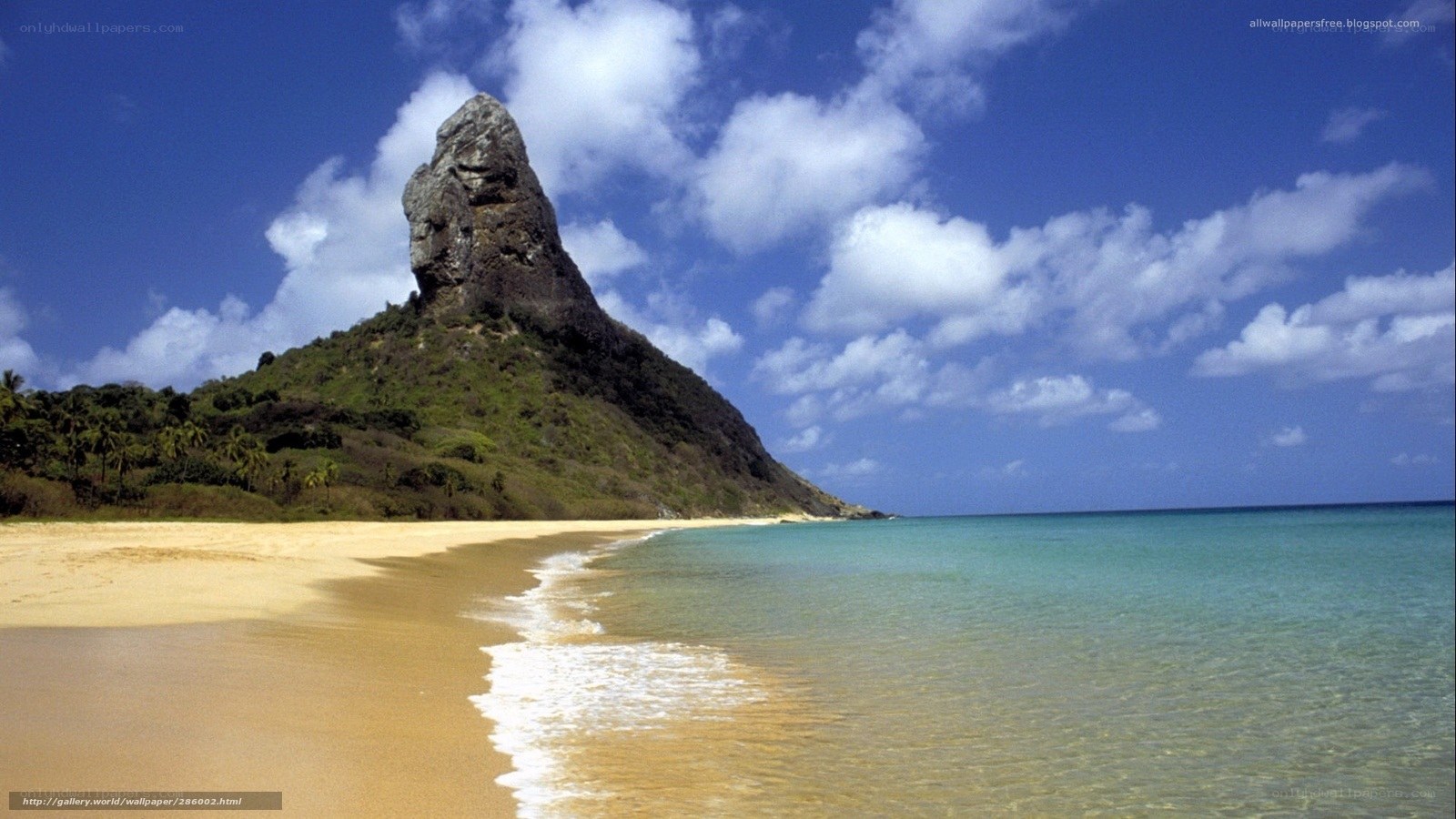 Beach with rocky hill