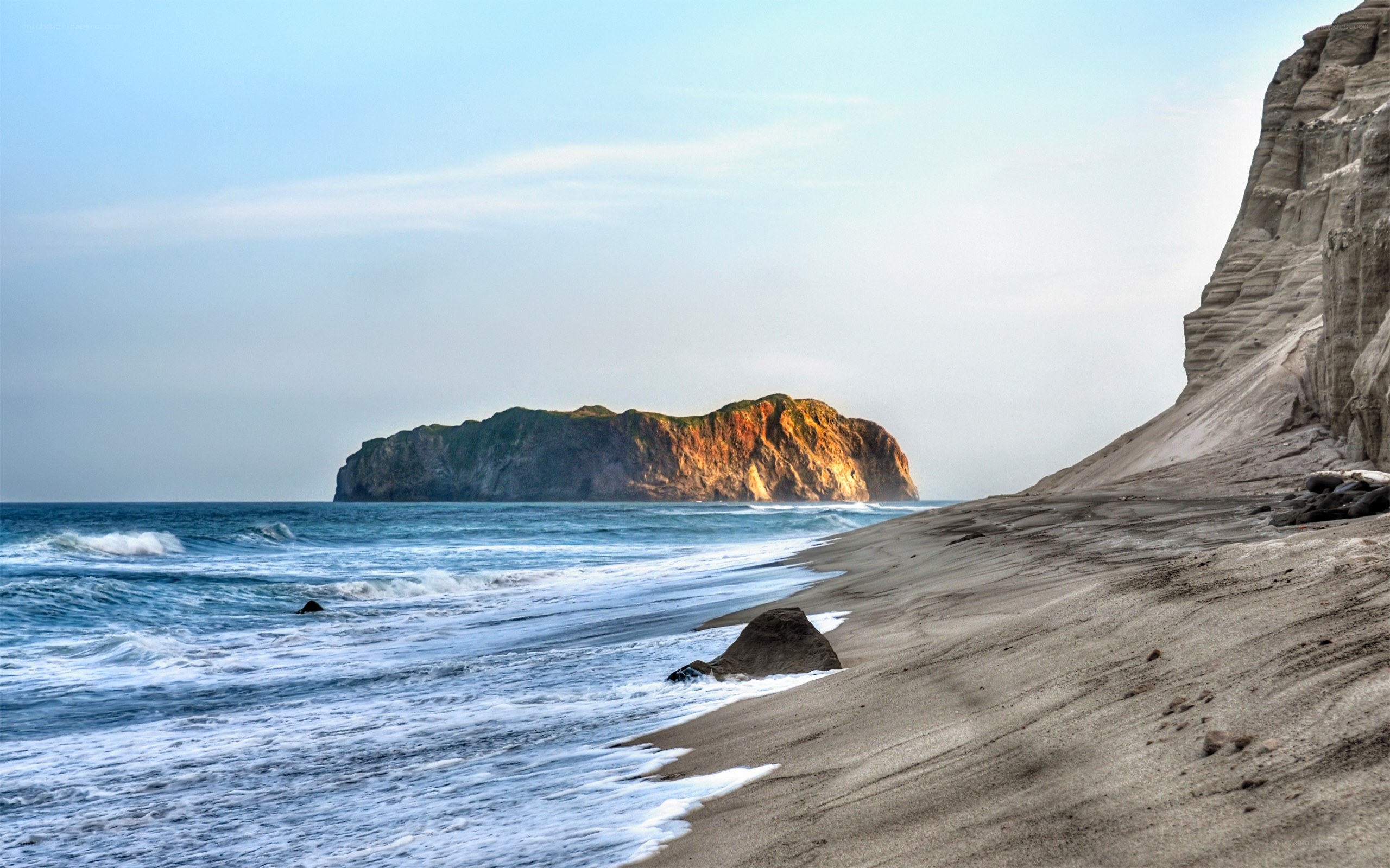 Beach with rocky island