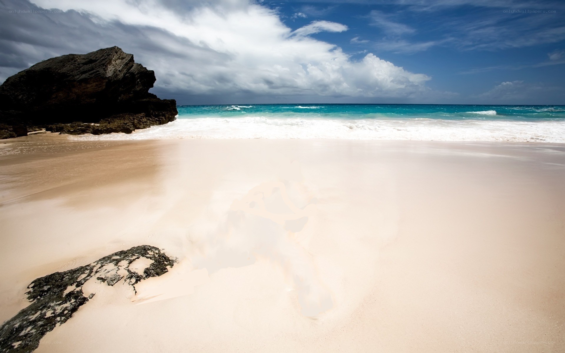 Beach with rocky outcrop