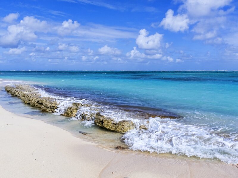 Beach with Rocky Outcrop — Blue