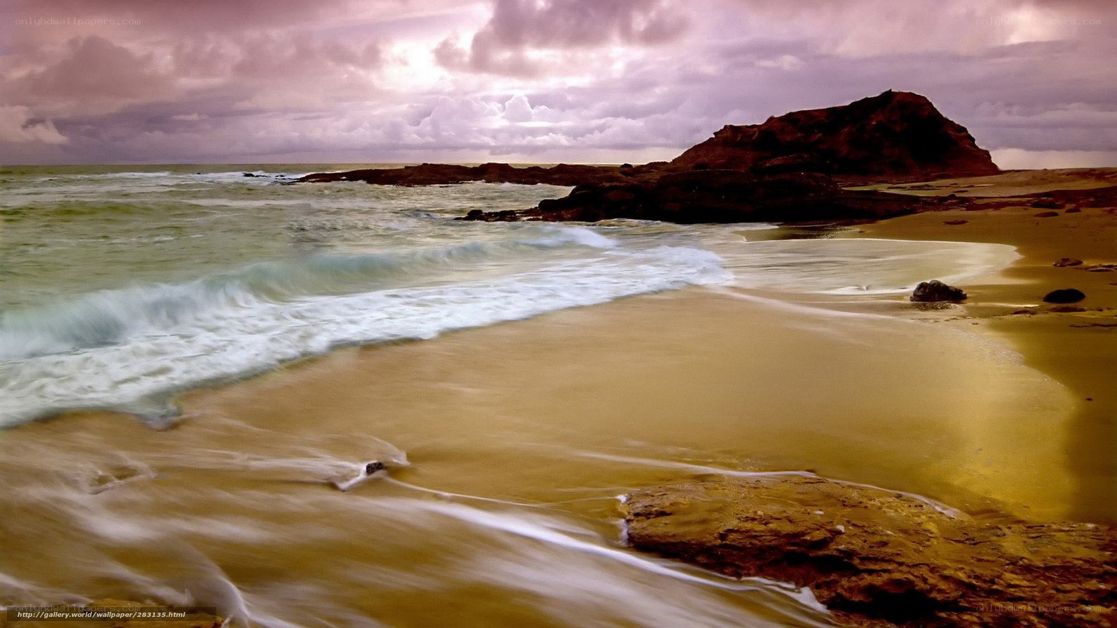 beach with rocky outcrop