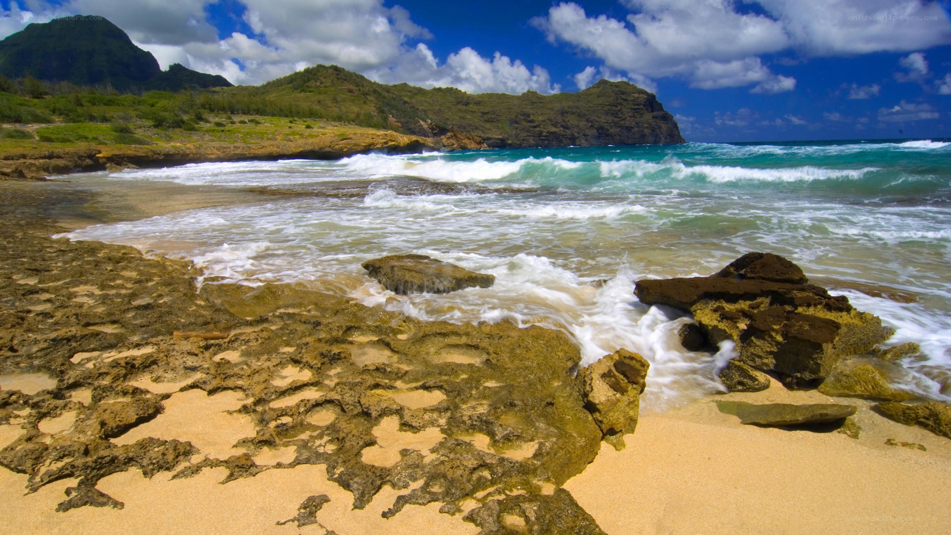 beach with rocky shore and ocean waves