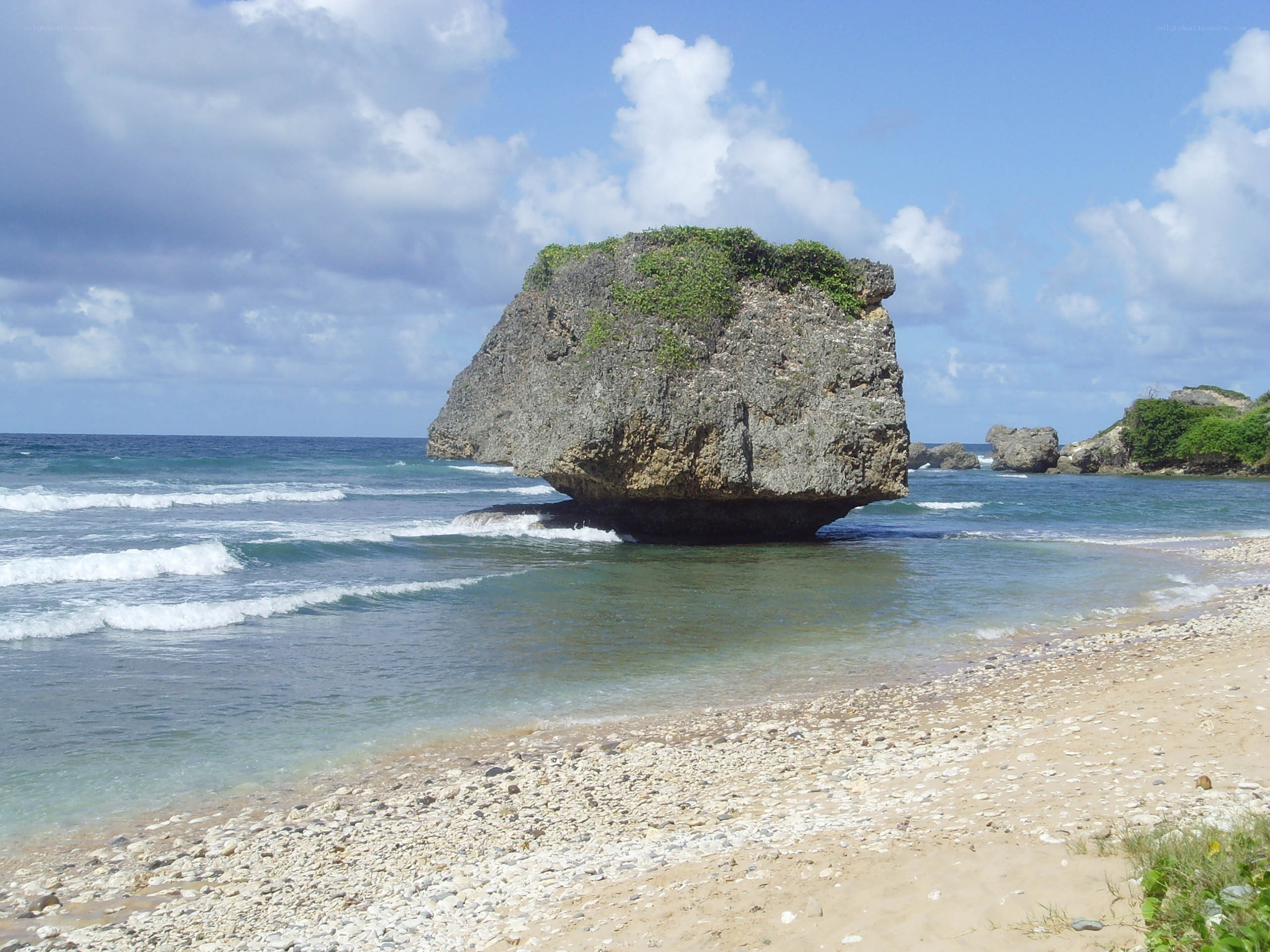 Beach with sea stack rock