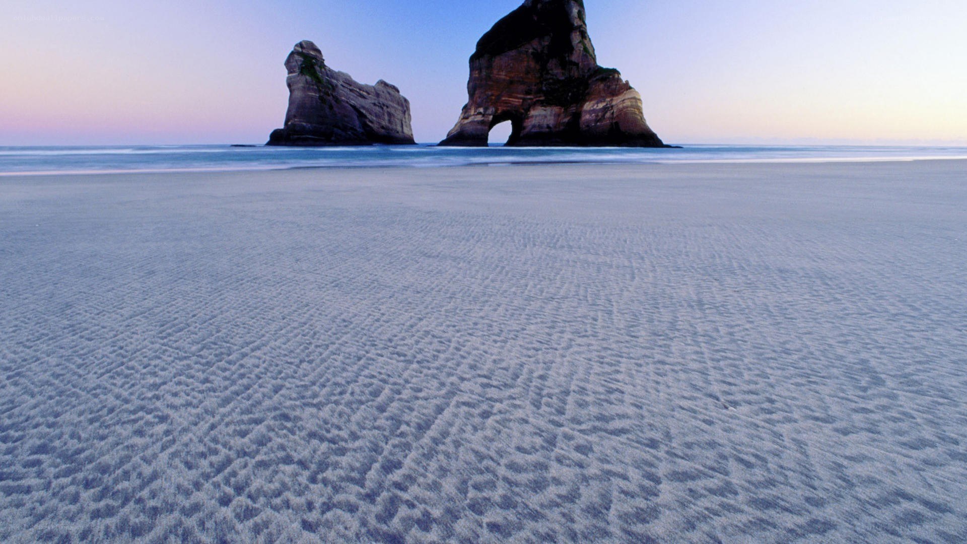 beach with sea stacks at dusk