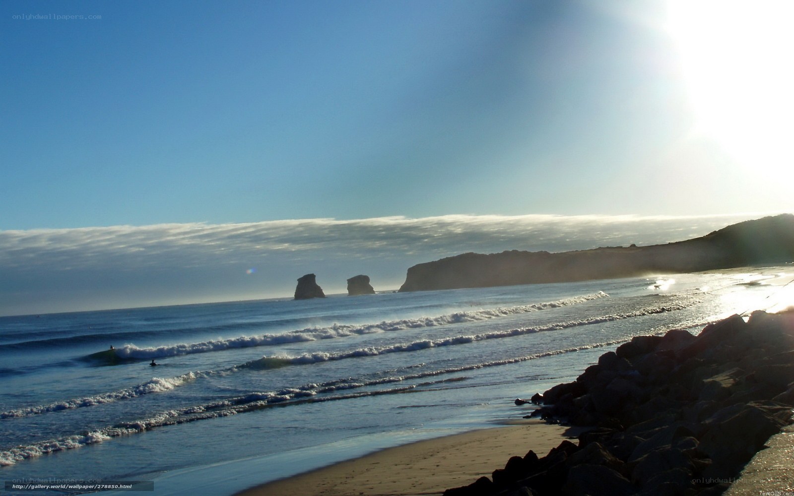 Beach with sea stacks at sunrise