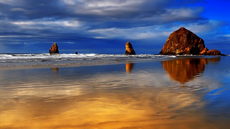 Beach with sea stacks at sunset