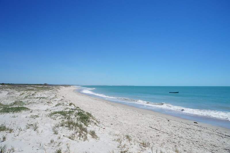 Beach with Small Boat — Blue, Serene