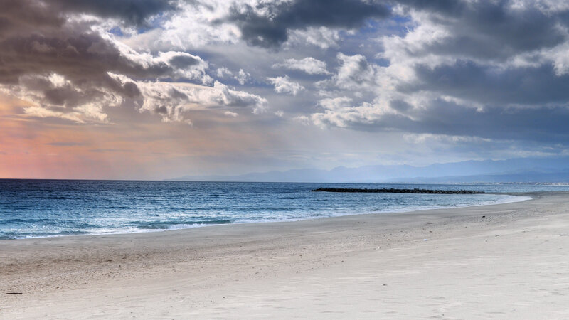 Beach with stormy sky