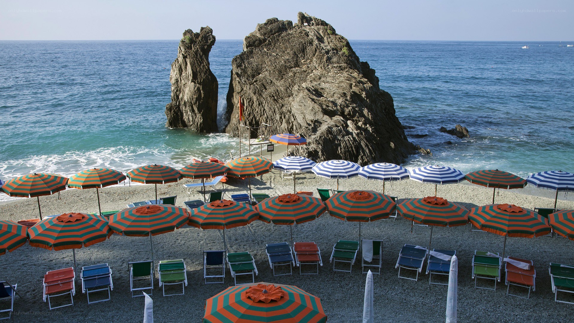 Beach with striped umbrellas