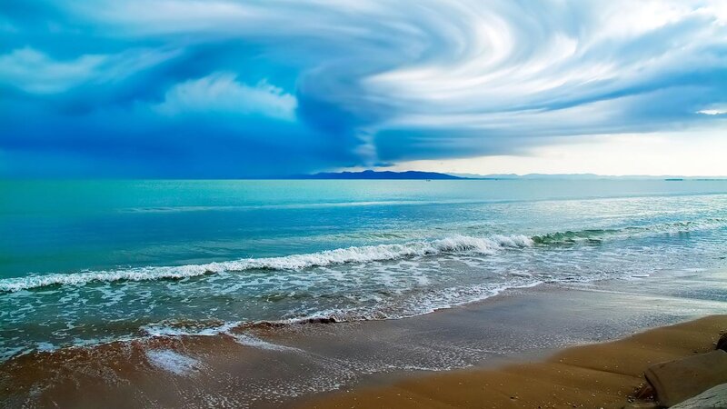 Beach with Swirling Clouds — Blue