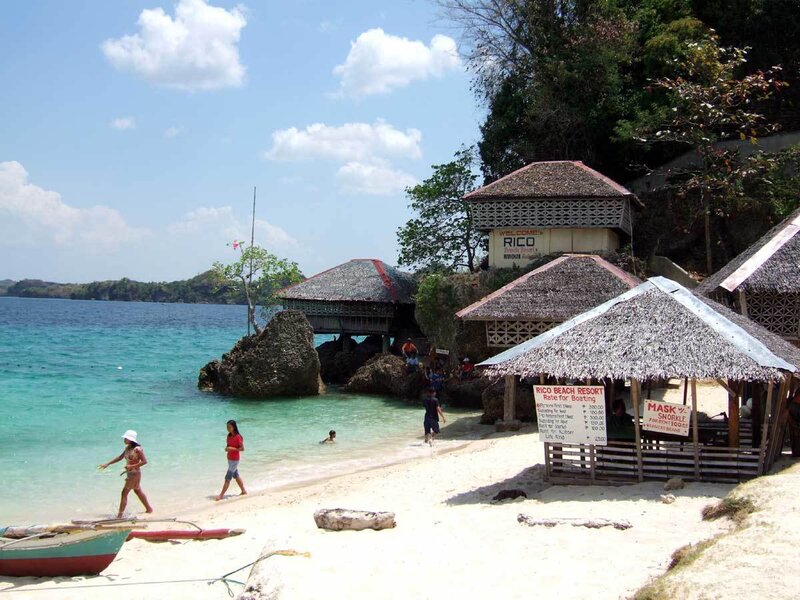 Beach with Thatched Huts
