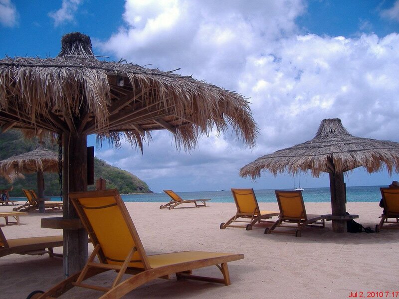 Beach with thatched umbrellas