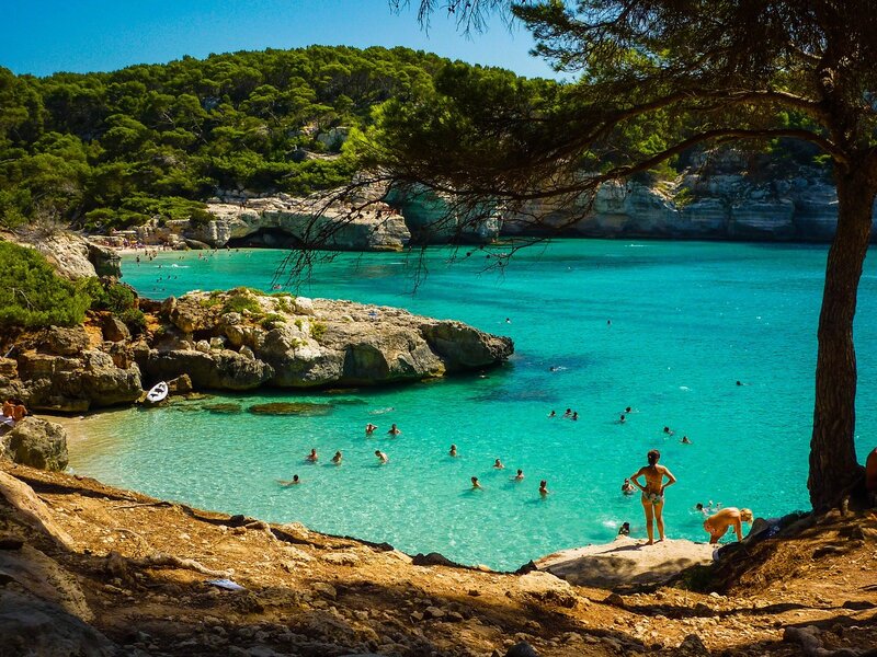 Beach with turquoise water and rocks