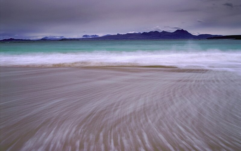 beach with turquoise waves