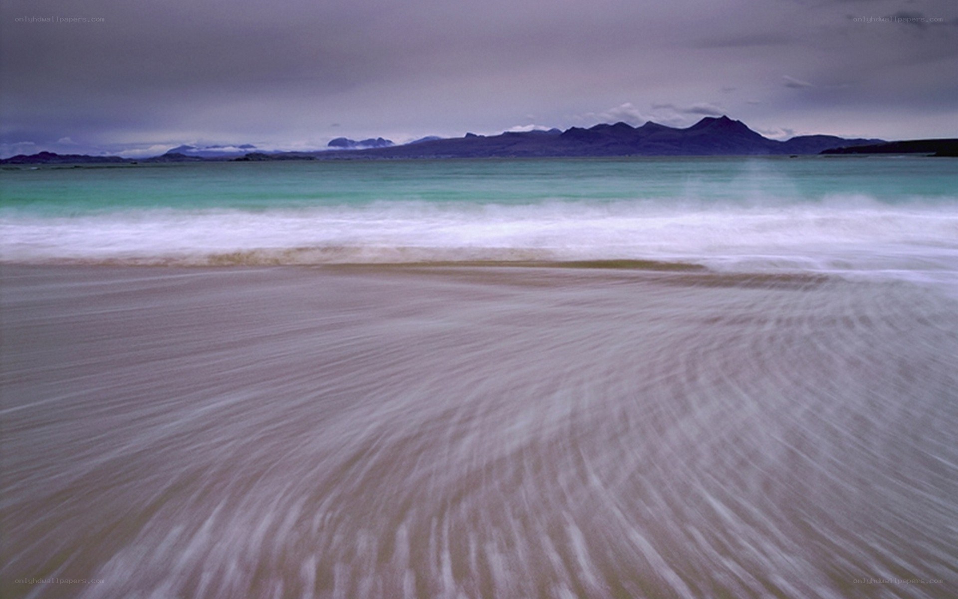 beach with turquoise waves