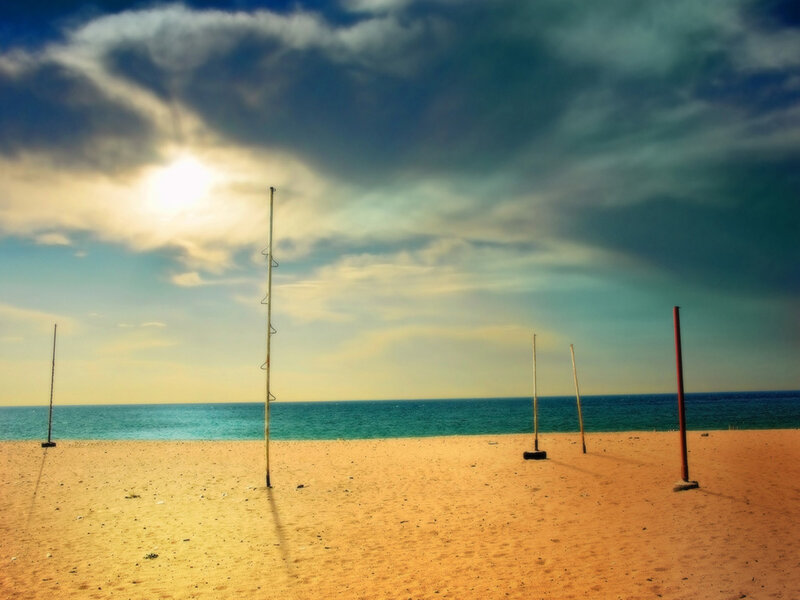 Beach with volleyball poles