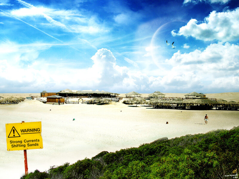 Beach with warning sign