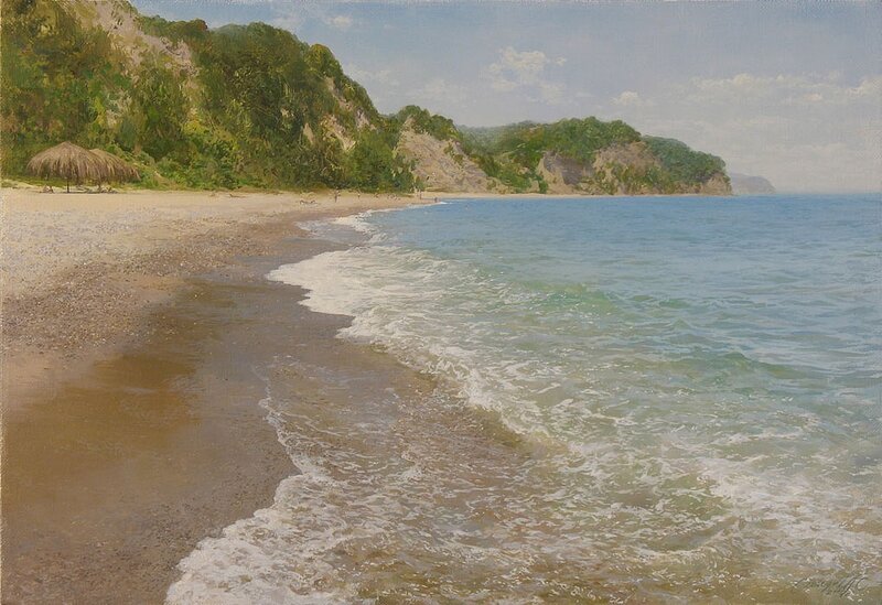 Beach with waves and cliffs