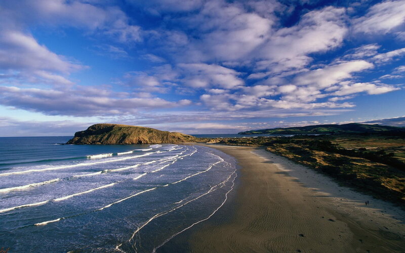 Beach with Waves and Rock