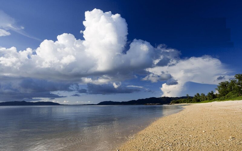 Beach with White Clouds — Blue, Serene