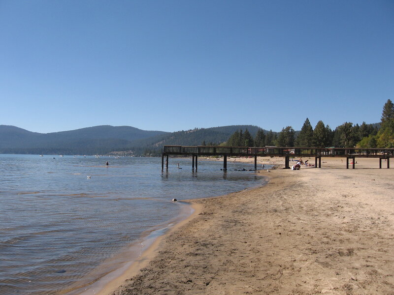 Beach with Wooden Pier — Blue, Serene