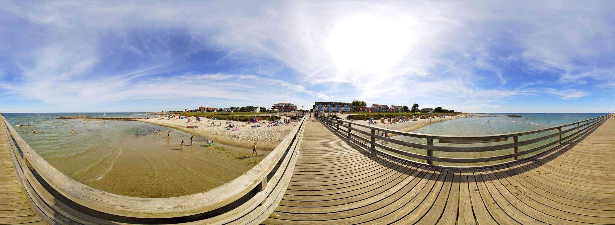 Beach with wooden pier