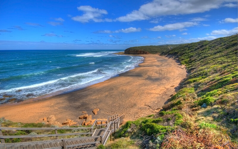 Beach with wooden stairs