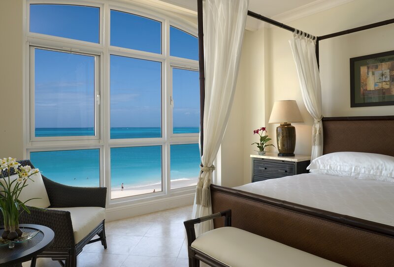Beachfront bedroom with ocean view