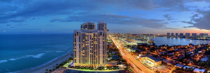 Beachfront city at dusk