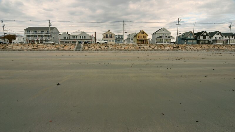 beachfront houses on overcast day