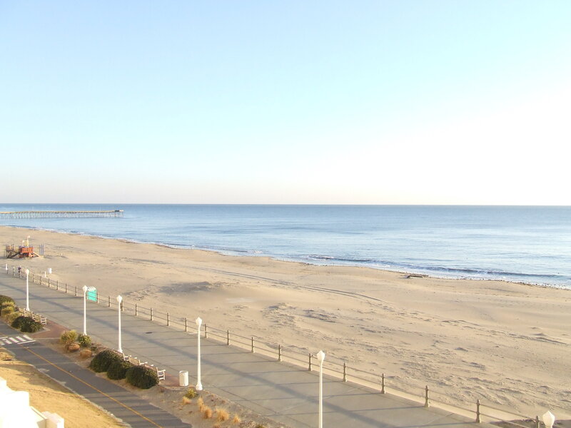 beachfront promenade with pier