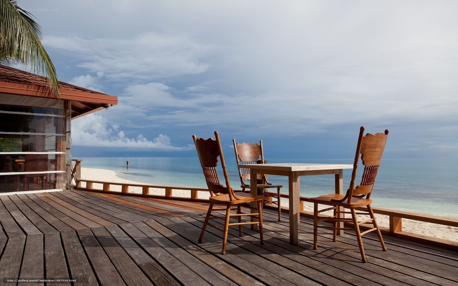Beachside deck with table and chairs