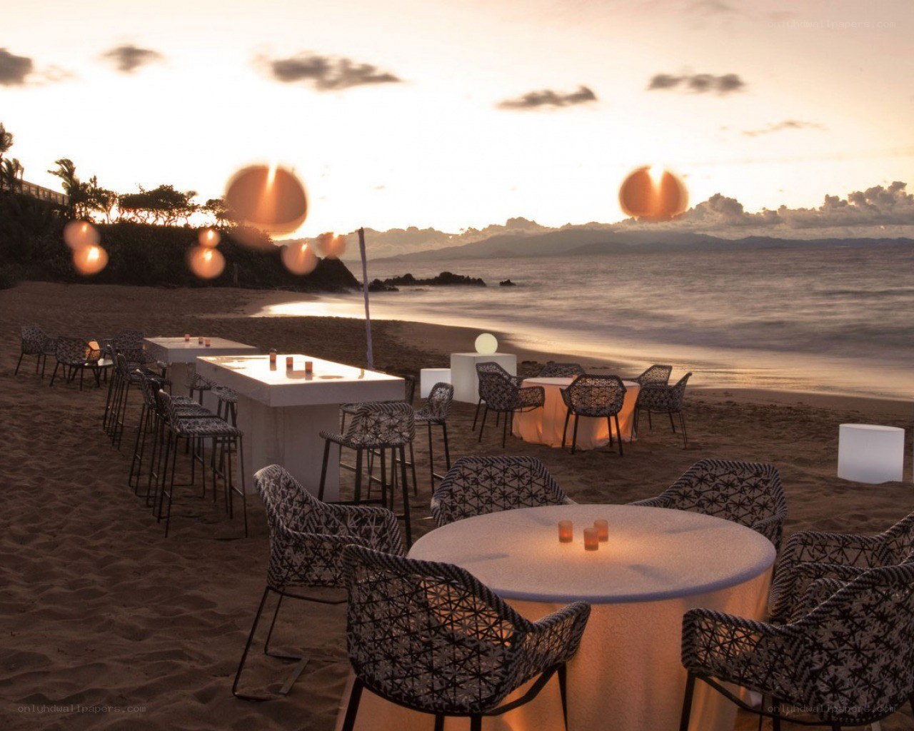 Beachside dining at sunset