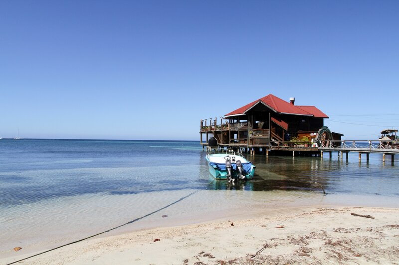 Beachside hut with boat