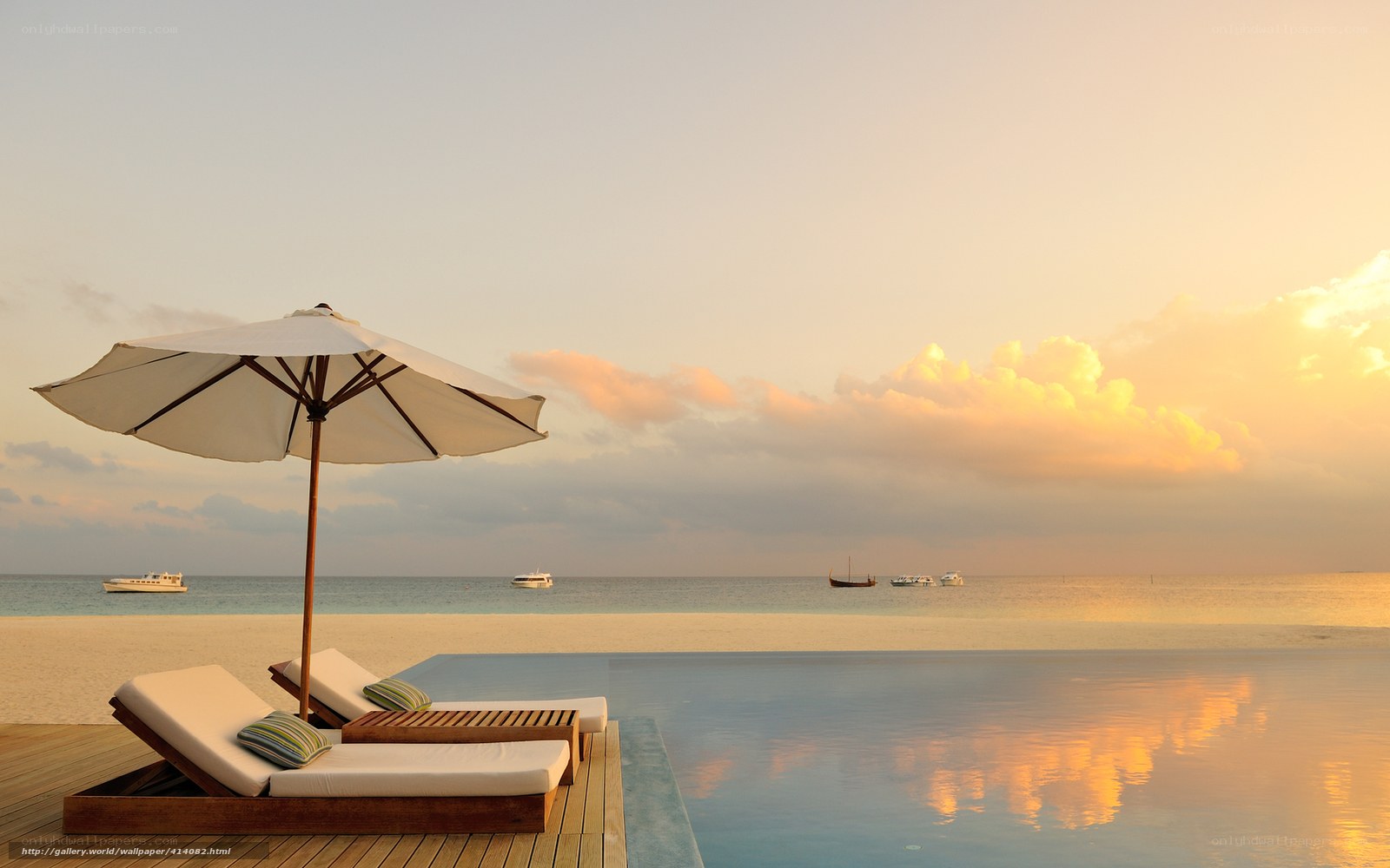 Beachside pool at sunset