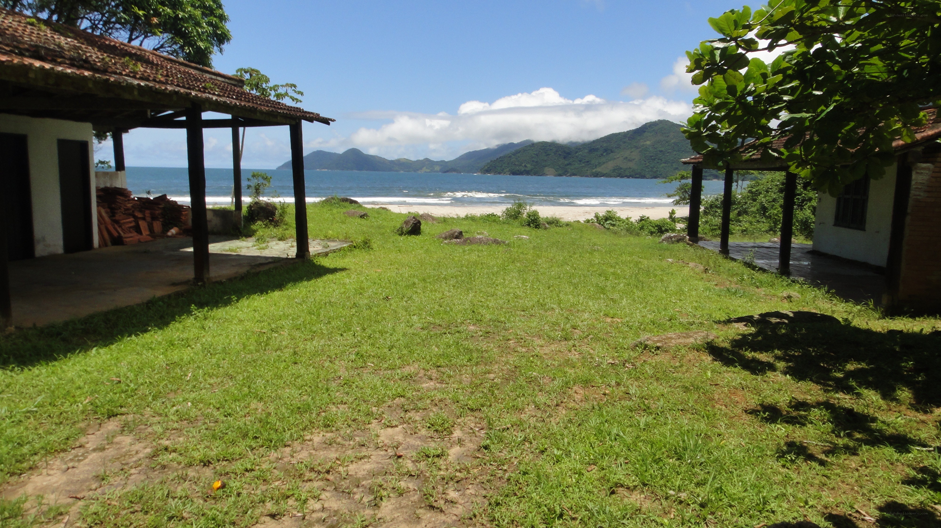 Beachside property with mountains