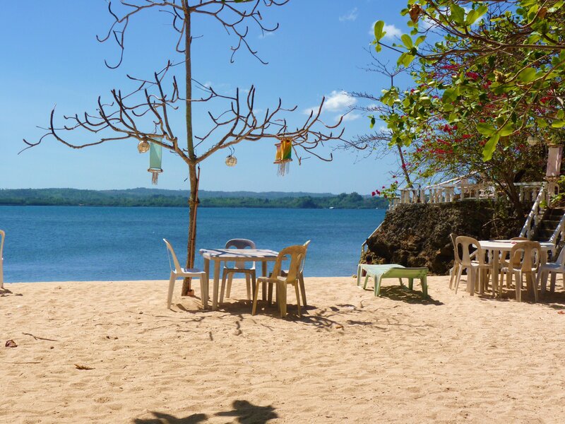 Beachside tables with lanterns