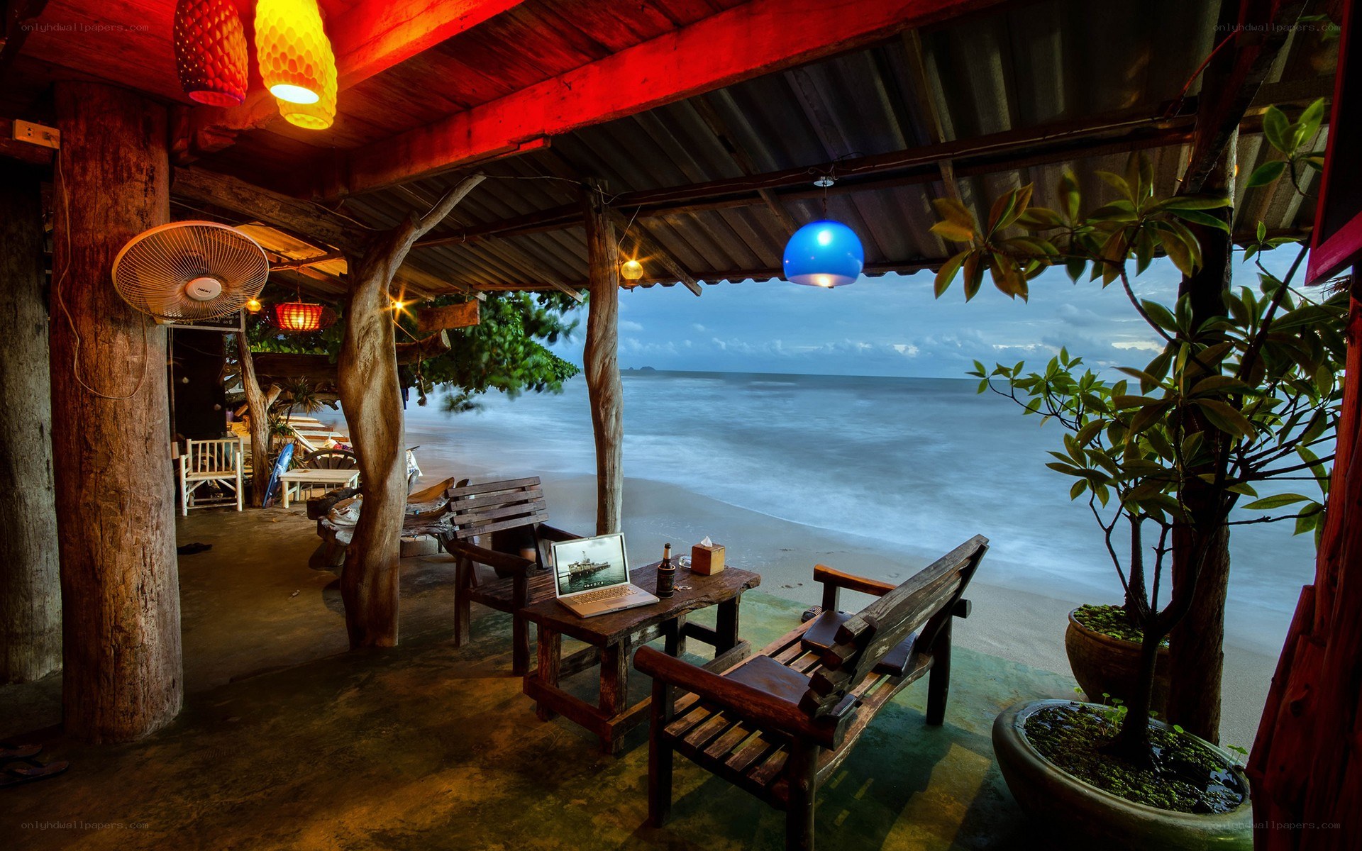 Beachside wooden hut at dusk