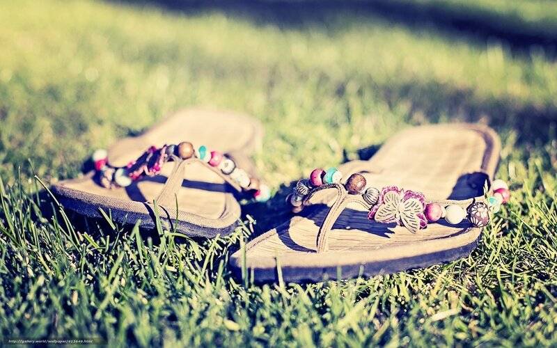 beaded sandals on grass